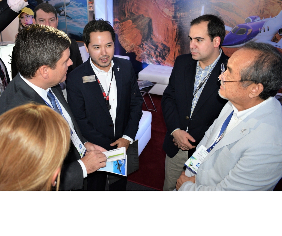 AeroExpo Panama Pacifico 2017 - Carlos Duboy, Tocumen SA (left) visiting the booth of Hondajet’s regional dealer Seijiro Yazawa Iwai: Also Pictured - Mitsuru M. Yazawa, Guillermos Suarez, and Mitsuru Yazawa of Seijiro Yazawa Iwai