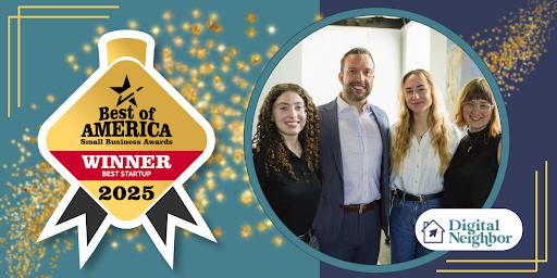 Digital Neighbor team celebrating award with smiling faces and banner
