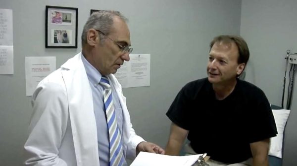 Dr. Cherkassky Medical Weight Loss Doctor in Dallas TX with a patient